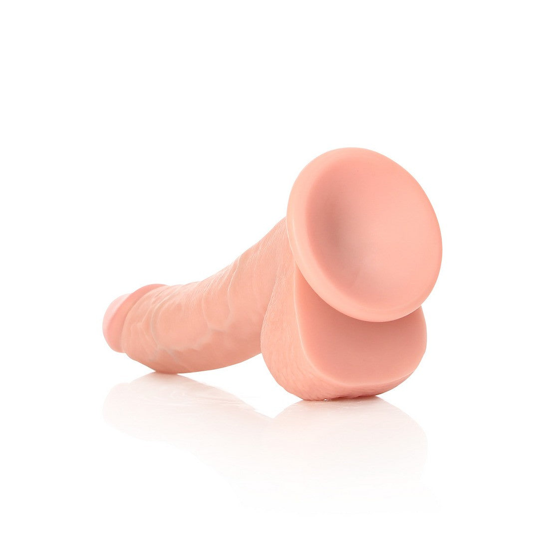 DILDO REALISTA CON TESTICULOS CURVED 8 /20.5 CM FLESH REALROCK